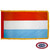 The indoor Luxembourg flag has 3 sides of gold fringe around a horizontal red, white, and blue tricolor. FMAA Certified Made in America seal.
