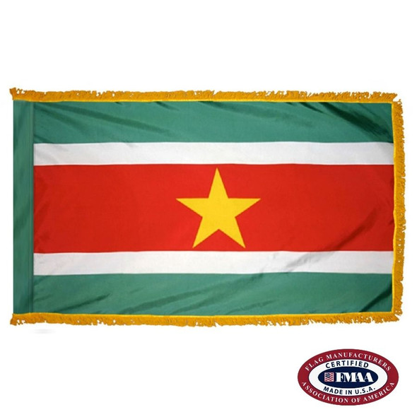 The indoor Suriname flag has 3 sides of gold fringe around 5 horizontal green, white, and red stripes. In the center is a yellow star. FMAA Certified Made in America seal.