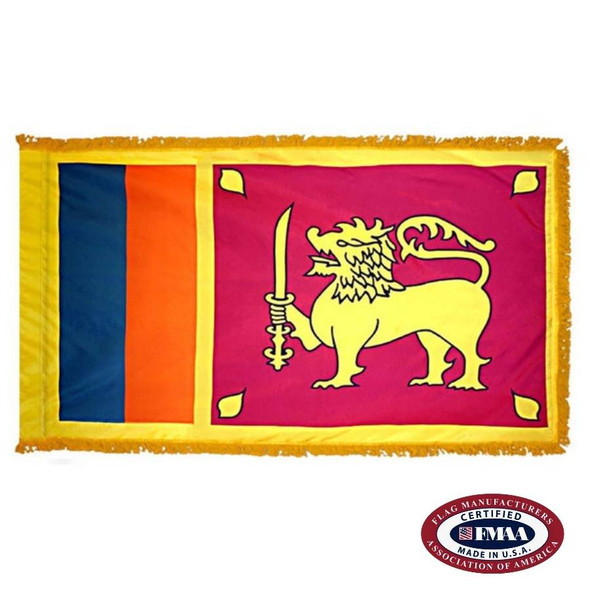 The indoor Sri Lanka flag has 3 sides of fringe around a yellow field with green & orange stripes on the left & a gold lion on the right. FMAA Certified Made in America seal.