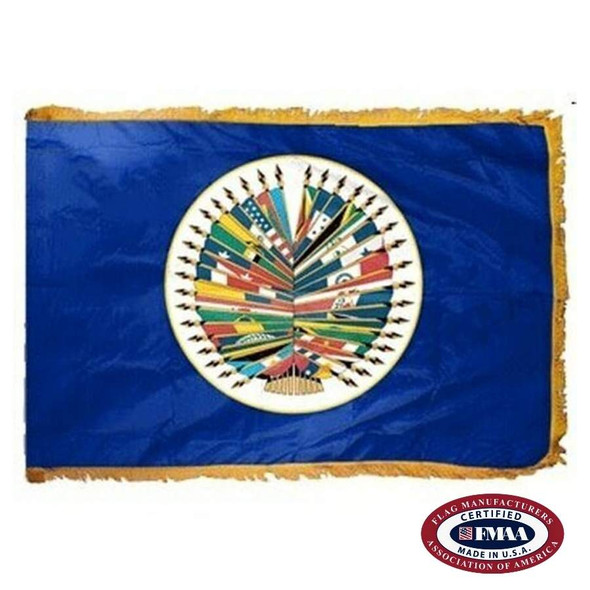 The indoor OAS flag has 3 sides of gold fringe around a blue field with a white circle containing all American country flags in the center. FMAA Certified Made in America seal.