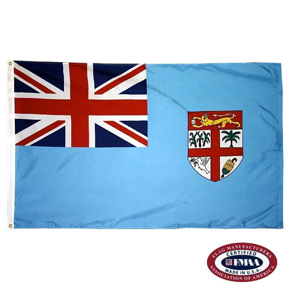 The Fiji flag is light blue with a Union Jack in the canton and a coat of arms on the right consisting of a red cross on a white shield. FMAA Certified Made in America seal.