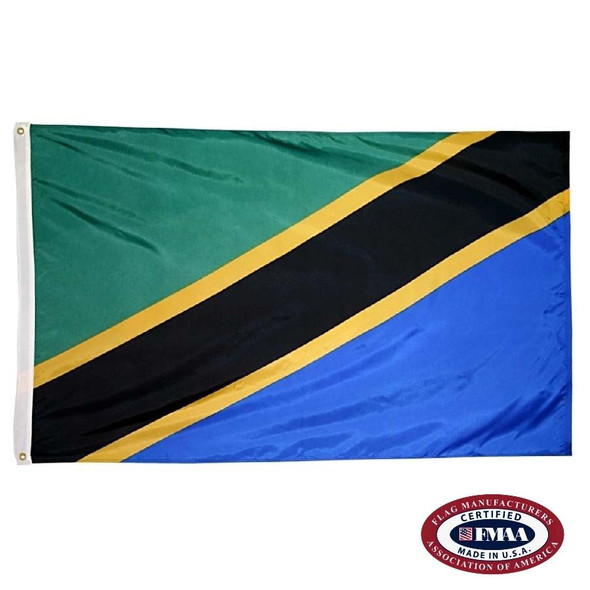 The Tanzania flag has 2 green and blue triangles separated by a diagonal black stripe outlined in gold. FMAA Certified Made in America seal.