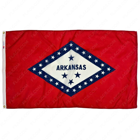 The Arkansas flag is red with a blue-outlined white diamond in the center, with “Arkansas” written inside with 4 blue stars. There are 25 white stars in the outline.