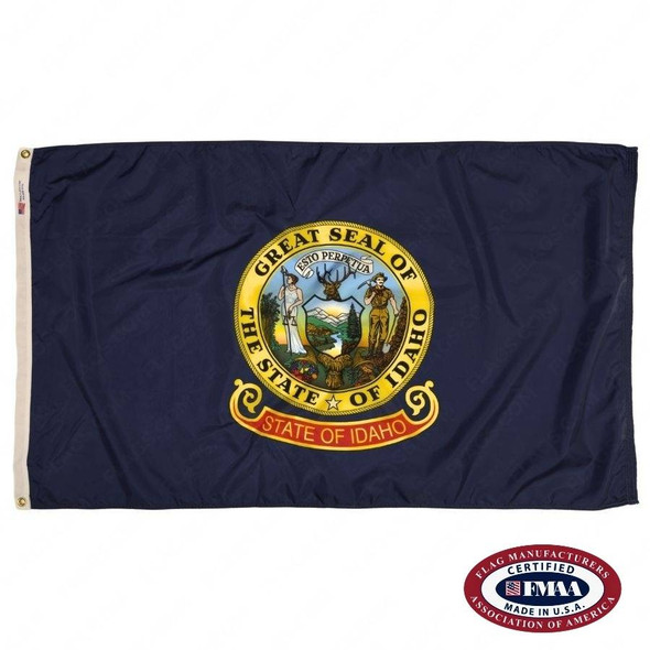 The Idaho flag is dark blue with the state seal in the center. In the seal stands Lady Justice & a miner on either side of the Idaho landscape. FMAA Certified Made in America seal.