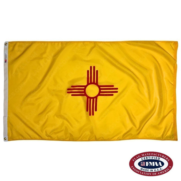 The New Mexico flag is yellow and has a red Zia sun symbol in the center. FMAA Certified Made in America seal.