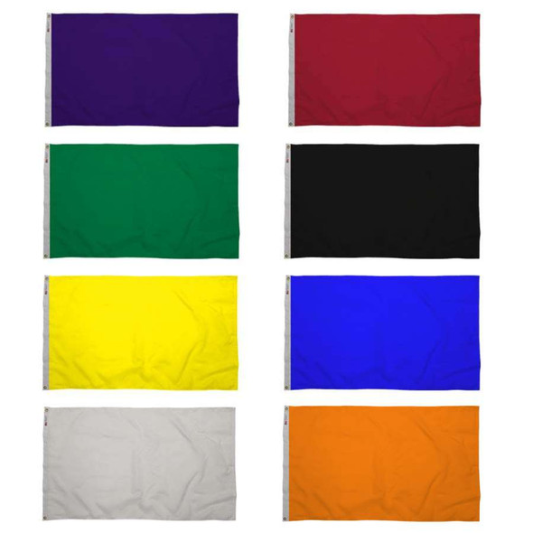 Eight solid-colored flags are shown in the colors purple, red, green, black, yellow, blue, white, and pink.