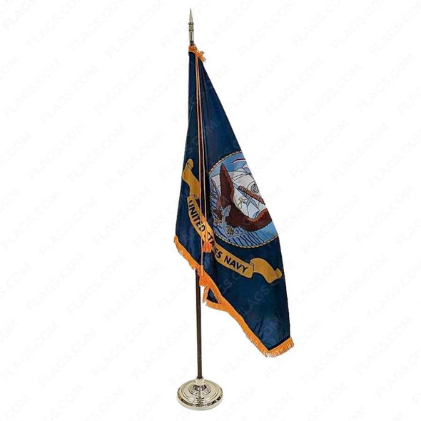 The US Navy flag with gold fringe is displayed on an oak pole with a gold stand and spear ornament.