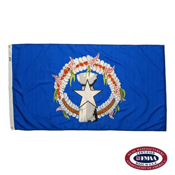 The Northern Mariana Islands flag is blue with a white star in the center on top of a gray latte stone, surrounded by a wreath of flowers. FMAA Certified Made in America seal.