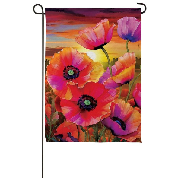 A Poppy Sunset Suede Garden Flag depicting several poppies in front of a sunset.