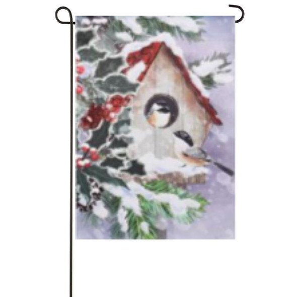 A Winter Bird House Garden Flag depicting two small birds next to a white birdhouse surrounded by snowy leaves.