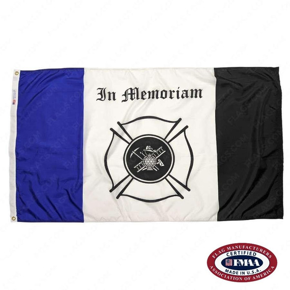 The Fireman Mourning Flag featuring a field of white with a strip of blue on the left and black on the right. In the middle is the words 'In Memoriam' with the firefighter symbol below. FMAA Certified Made in America seal.