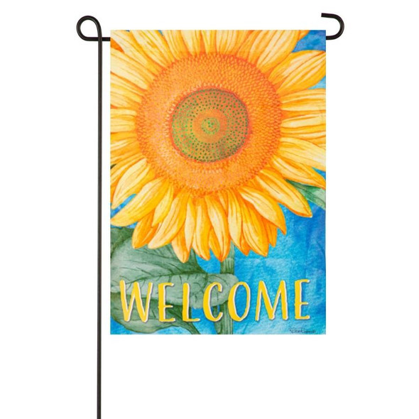 A garden flag depicting a large sunflower on a blue background with the text "Welcome" in yellow at the bottom.