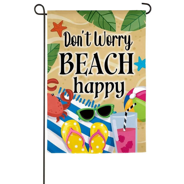 A garden flag depicting a crab, flipflops, sunglasses, a towel, and other items on a beach, with the text "Don't Worry Beach Happy" above.