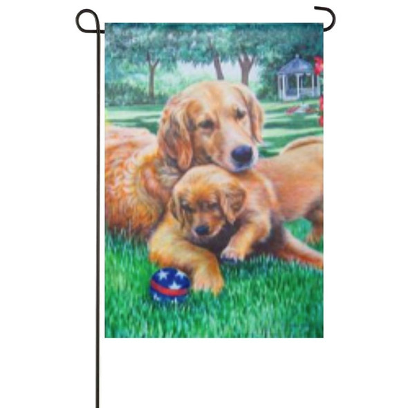 A Mom & Pup Garden Flag depicting two golden retrievers lying on a lawn with a blue, red, and white ball.