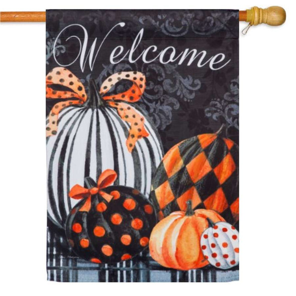 A Elegant Pattern Pumpkins Suede House Flag depicting five pumpkins with various black, white, and orange designs. At the top the text "Welcome" is written.