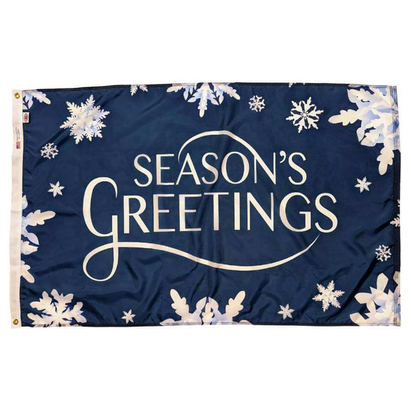 A dark blue flag with the text "Season's Greetings" written in white and surrounded by snowflakes.