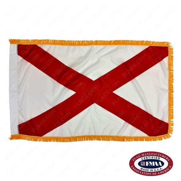 The indoor Alabama flag has a red saltire on a white background. Three edges of the flag are finished with gold fringe. FMAA Certified Made in America seal.