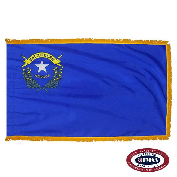 The indoor Nevada flag has 3 sides of gold fringe around the blue field. In the canton are a star, 2 sagebrush branches and the state motto. FMAA Certified Made in America seal.