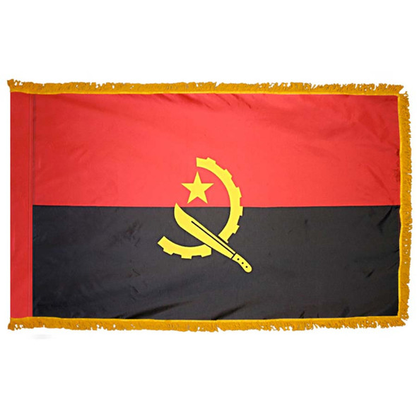 The indoor Angola flag has 3 sides of gold fringe around 2 horizontal red and black stripes. In the center is a gold gearwheel, machete, and star.