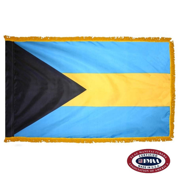 The indoor Bahamas flag has 3 sides of gold fringe around the 3 horizontal blue, yellow, and blue stripes. On the left is a black triangle. FMAA Certified Made in America seal.