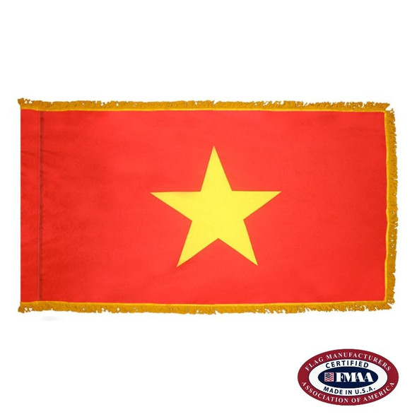 The indoor Vietnam flag has 3 sides of gold fringe around the red field. In the center is a large yellow star. FMAA Certified Made in America seal.