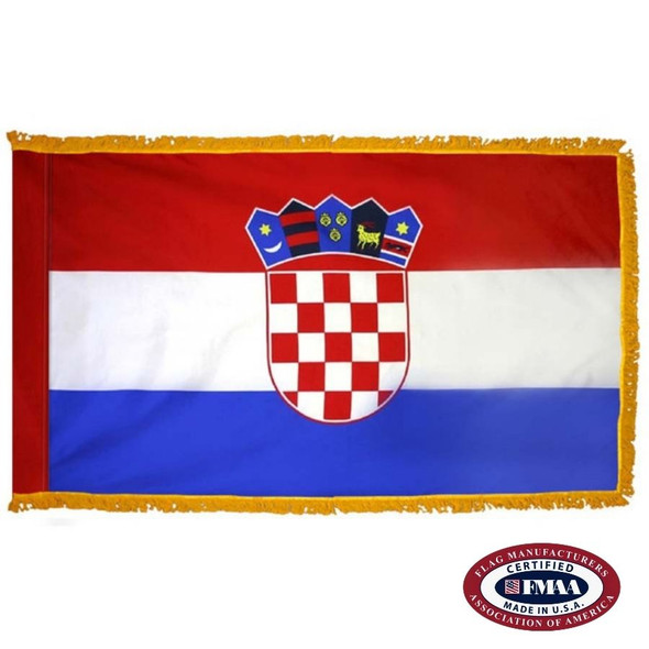 The indoor Croatia flag has 3 sides of gold fringe around a horizontal red, white, and blue tricolor. In the center is a coat of arms. FMAA Certified Made in America seal.