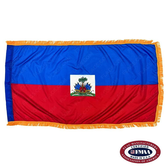 The indoor Haiti flag has 3 sides of gold fringe around 2 horizontal blue and red stripes. In the center is the national coat of arms. FMAA Certified Made in America seal.