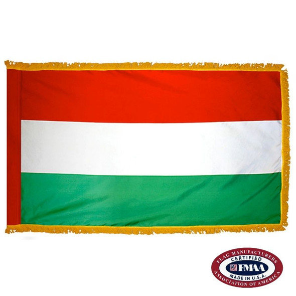 The indoor Hungary flag has 3 sides of gold fringe around a horizontal red, white, and green tricolor. FMAA Certified Made in America seal.