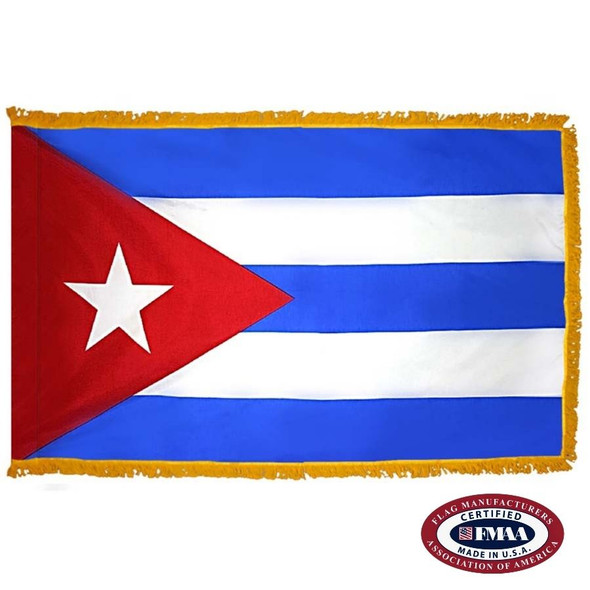 The indoor Cuba flag has 3 sides of gold fringe around 5 horizontal blue and white stripes. On the left is a red triangle and a white star. FMAA Certified Made in America seal.