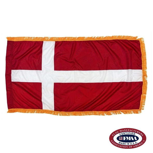 The indoor Denmark flag has 3 sides of gold fringe around a red field with a horizontal white cross. FMAA Certified Made in America seal.