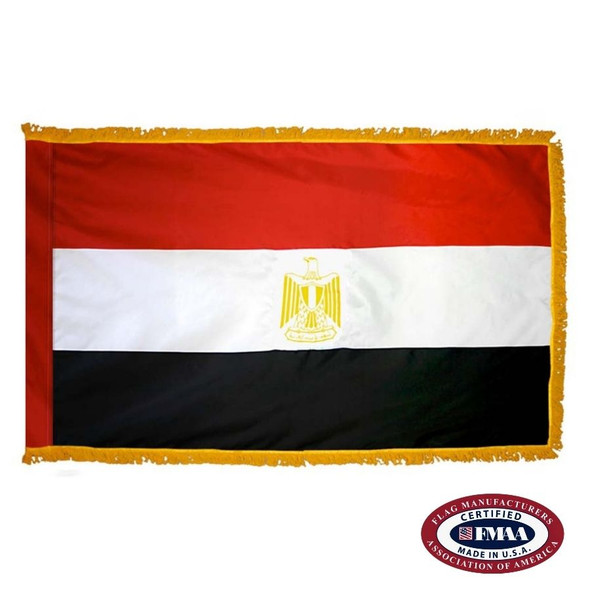 The indoor Egypt flag has 3 sides of gold fringe around a horizontal red, white, and black tricolor. In the center is a gold eagle. FMAA Certified Made in America seal.