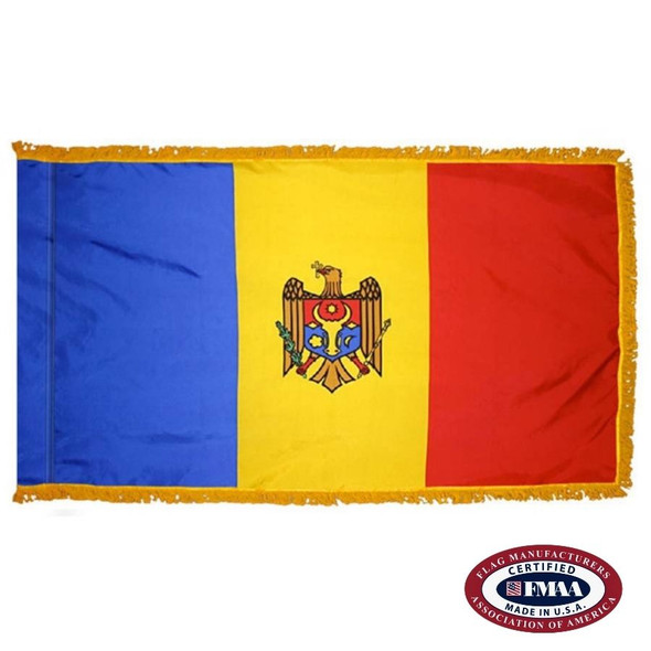 The indoor Moldova flag has 3 sides of gold fringe around a vertical blue, yellow, and red tricolor. In the center is an eagle and shield. FMAA Certified Made in America seal.
