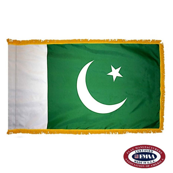 The indoor Pakistan flag has 3 sides of gold fringe around a green field with a white field on the left and a crescent & star on the right. FMAA Certified Made in America seal.
