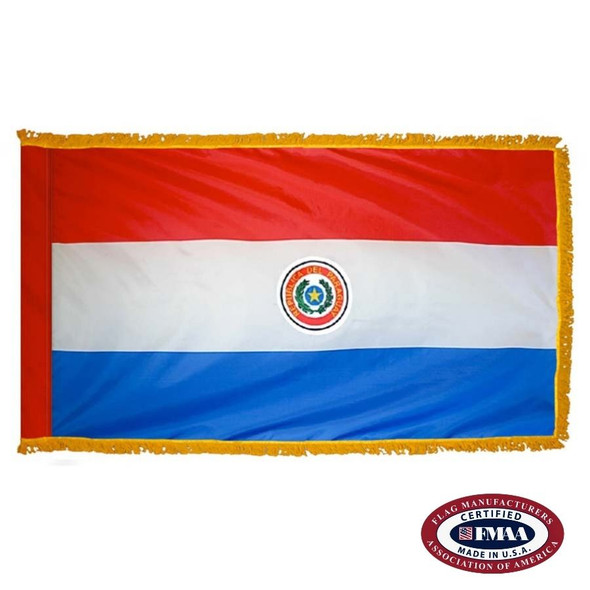 The indoor Paraguay flag has 3 sides of gold fringe around a horizontal red, white, and blue tricolor. In the center is a coat of arms. FMAA Certified Made in America seal.