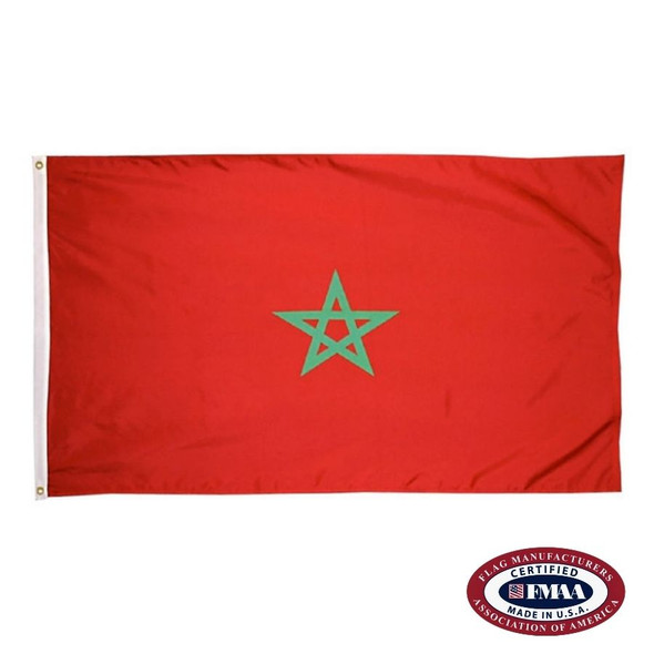 The indoor Morocco flag has 3 sides of gold fringe around a red field with a green star in the center. FMAA Certified Made in America seal.