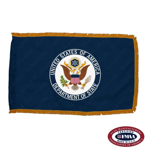 The indoor DOS flag is dark blue with a seal in the center depicting a bald eagle bearing an American flag shield on its chest.