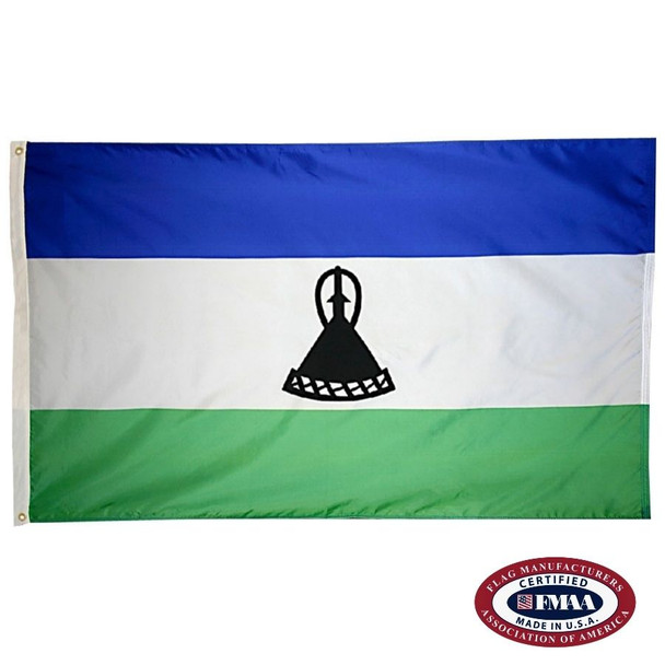 The Lesotho flag is a horizontal blue, white, and green tricolor. In the wider white stripe is a black mokorotlo hat. FMAA Certified Made in America seal.