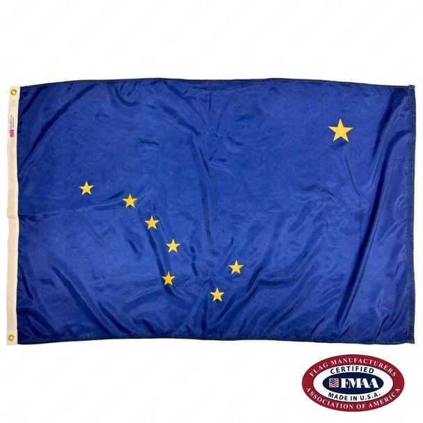 The Alaska flag has eight gold stars on a dark blue field depicting the Big Dipper & the North Star. FMAA Certified Made in America seal.