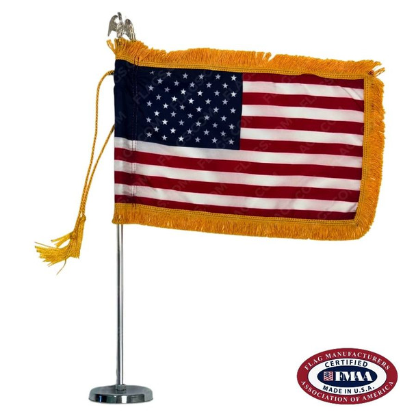 Small American flag with fringe on a small pole with an eagle ornament. FMAA Certified Made in America seal.