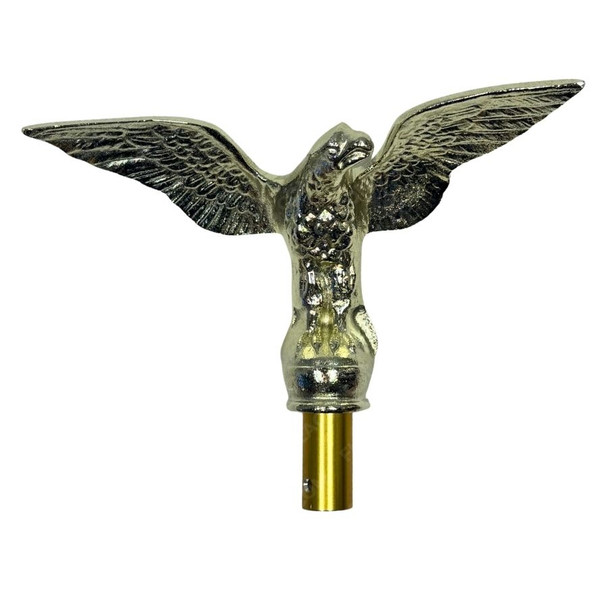 The Perched Eagle Ornament depicts a gold-colored bald eagle with its wings outstretched on top of a cylinder.