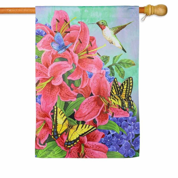 A house flag depicting a hummingbird and two yellow butterflies surrounding pink flowers.