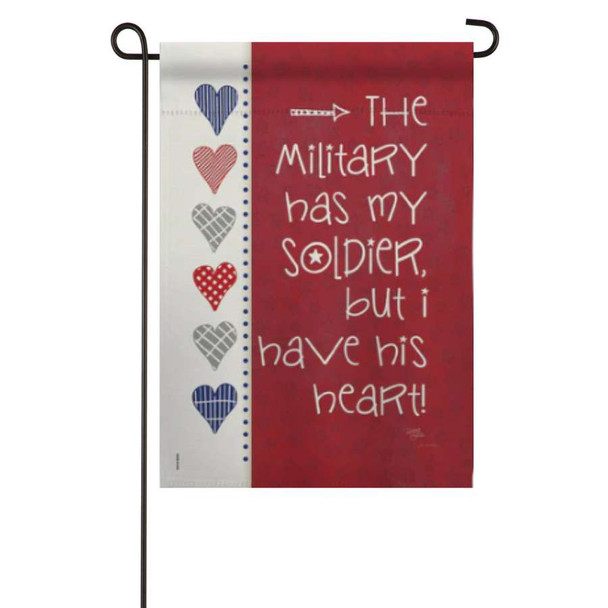 Garden flag with a white and red background and the message "The military has my soldier, but I have his heart!" with hearts in red, white, and blue.
