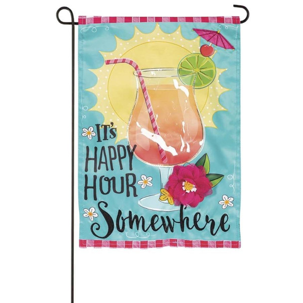 A garden flag depicting a large orange drink with a straw and lime wedge in front of a sun and light blue background. Below is the text "It's Happy Hour Somewhere" in black script.