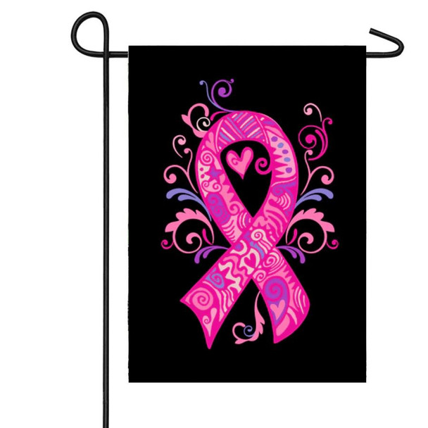 This garden flag features a pink patterned ribbon in front of a solid black background.