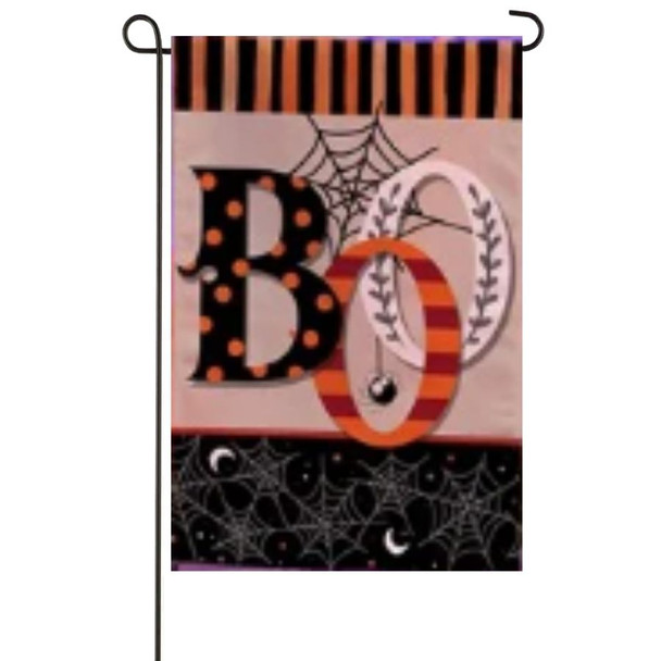 A garden flag depicting the word "BOO" in black, orange, and white surrounded by cobwebs and stripes.