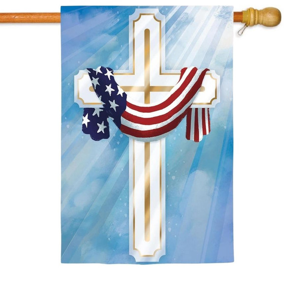 A Flag Draped Cross House Flag depicting a large white cross on a sky background, with an American flag draped over the cross.