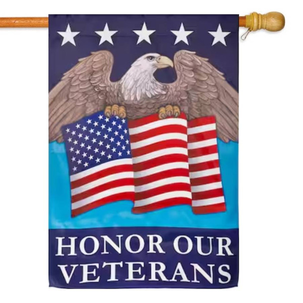 A house flag depicting an American flag with a bald eagle and the text "Honor our Veterans" below.