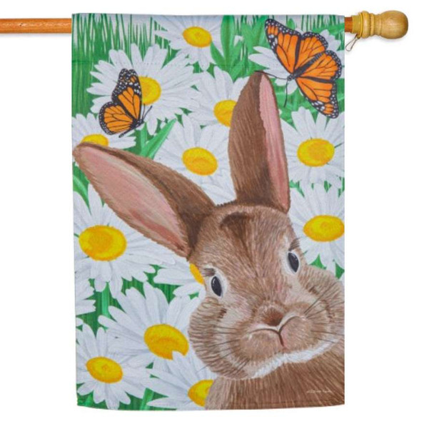 A house flag depicting a brown rabbit in front of a field of daisies, with two monarch butterflies overhead.