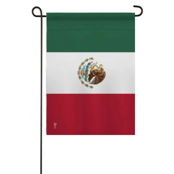 A garden flag featuring the design of the Mexican national flag, with 3 horizontal stripes of green, white and red. There is a seal with an eagle on the white stripe.