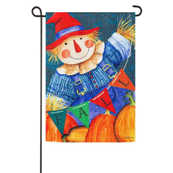 A Fall Fella Scarecrow Textured Suede Garden Flag depicting a scarecrow above some pumpkins, with the text "Fall" written across some pennant flags.